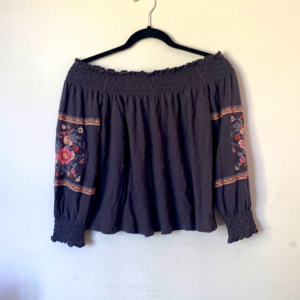 Off shoulder too with embroidery on sleeves